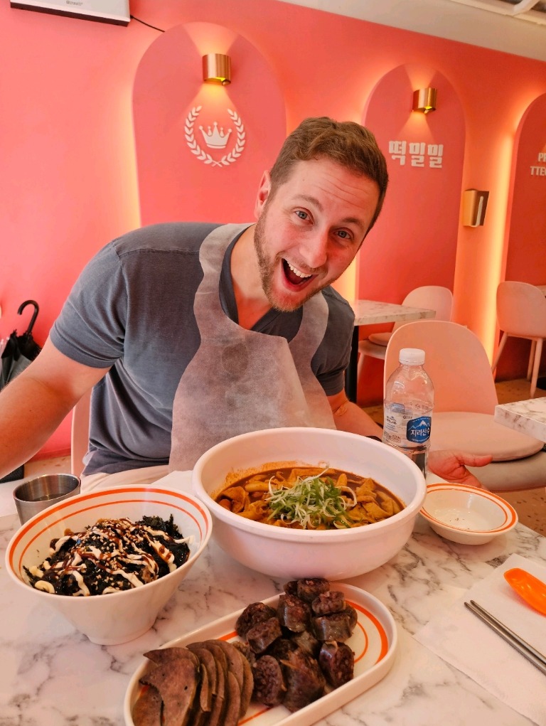 Jeffrey Persek sharing a meal at a restaurant